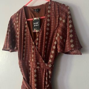 Beautiful bohemian flutter sleeve maxi dress. Brand new with tags!